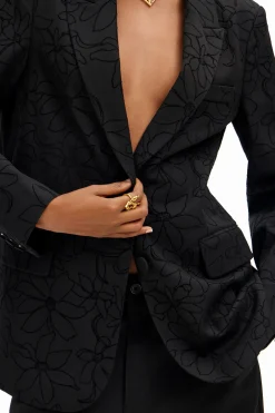 Blazer with die-cut flower silhouette