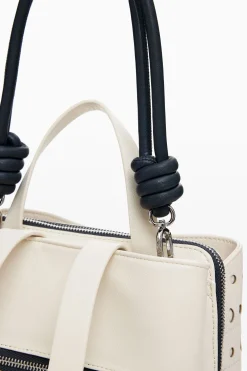 Circle pattern faux leather backpack