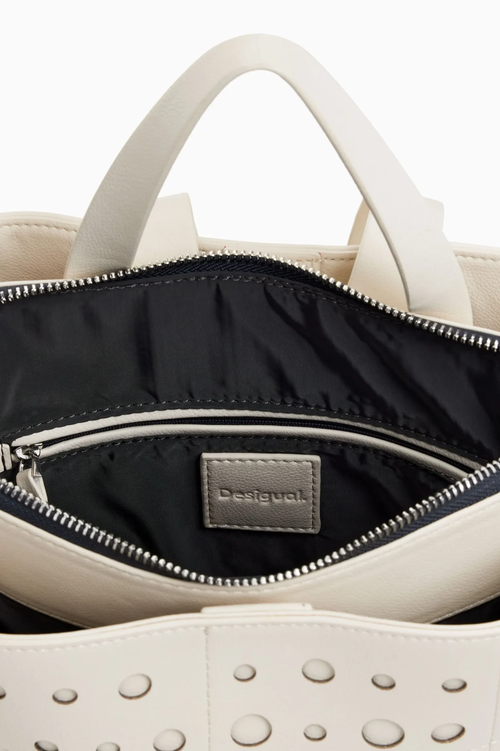 Circle pattern faux leather backpack