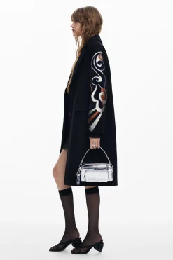 Coat with printed sleeves