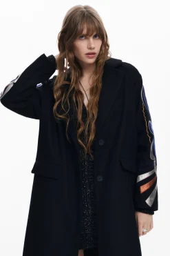 Coat with printed sleeves