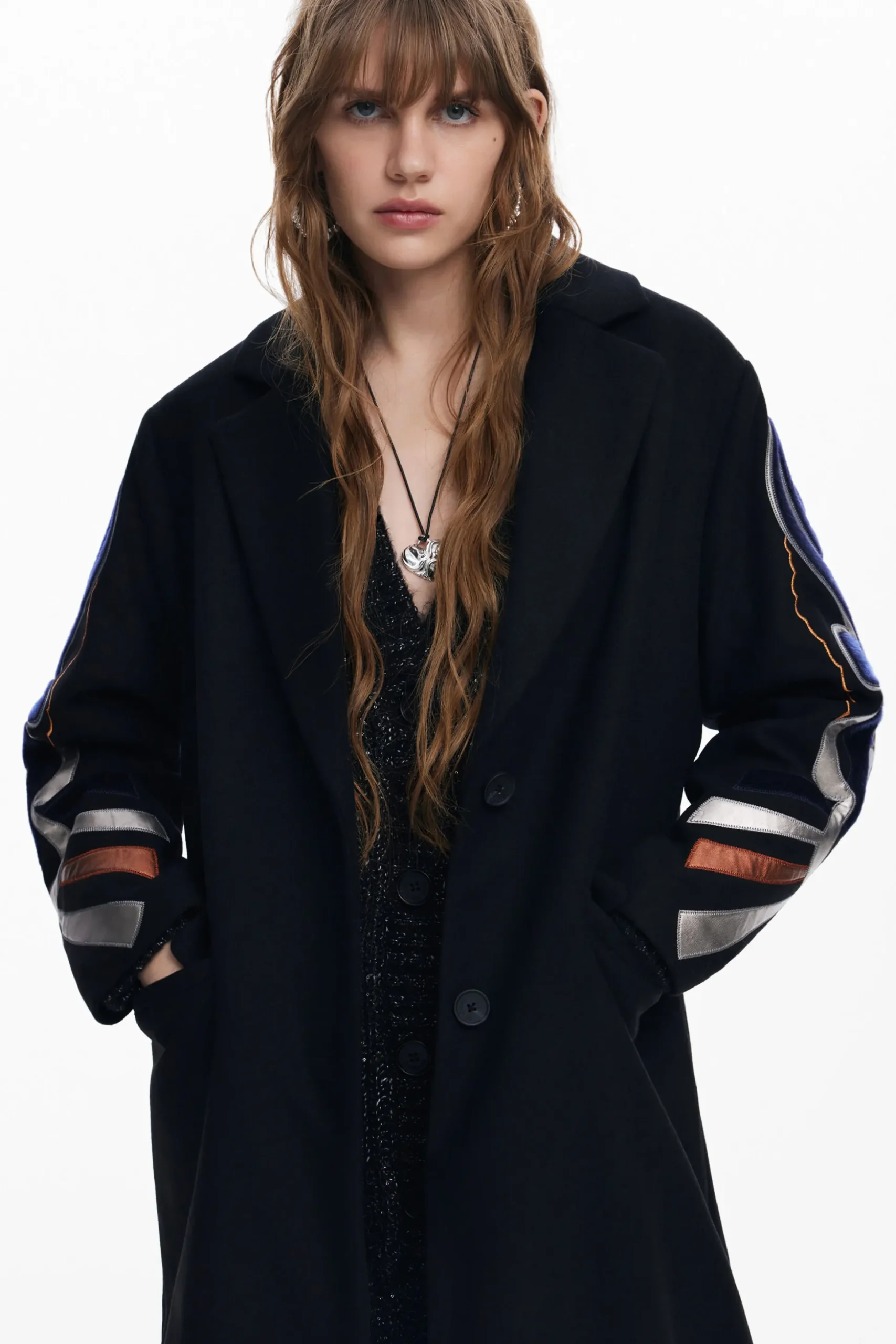 Coat with printed sleeves