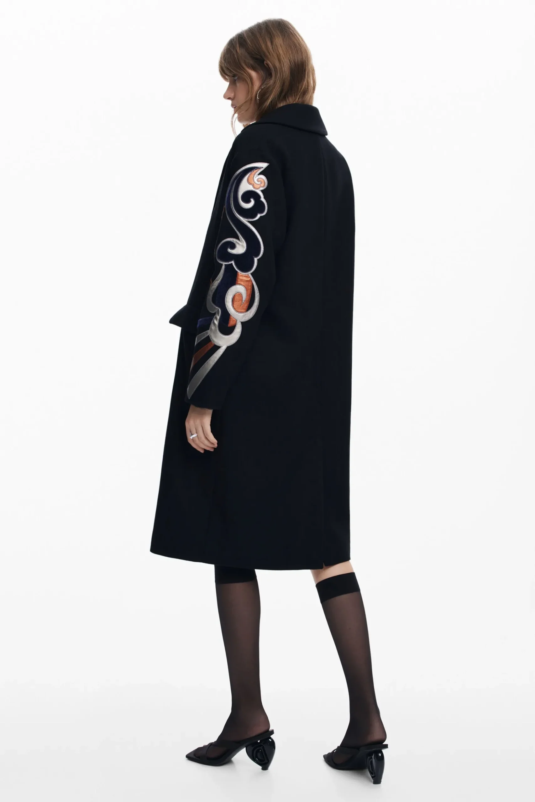 Coat with printed sleeves