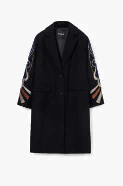 Coat with printed sleeves