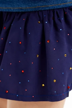 Denim mini skirt with ruffle and polka dots