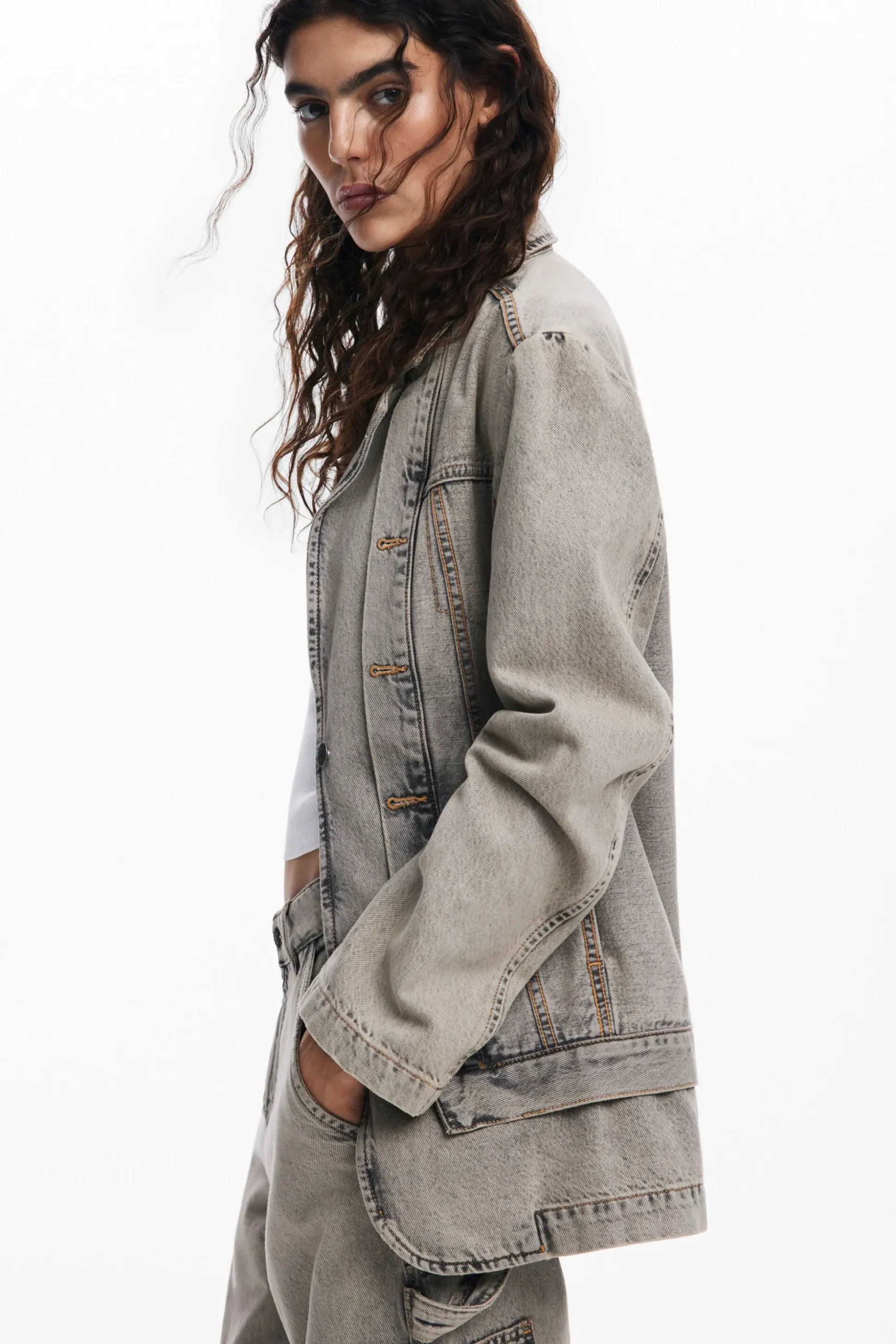 Distressed denim blazer