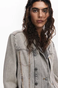 Distressed denim blazer