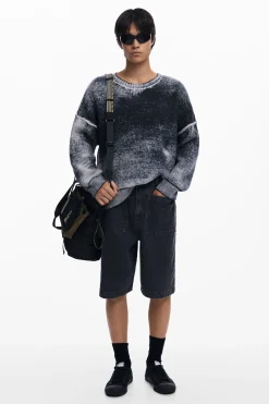 Distressed knit sweater