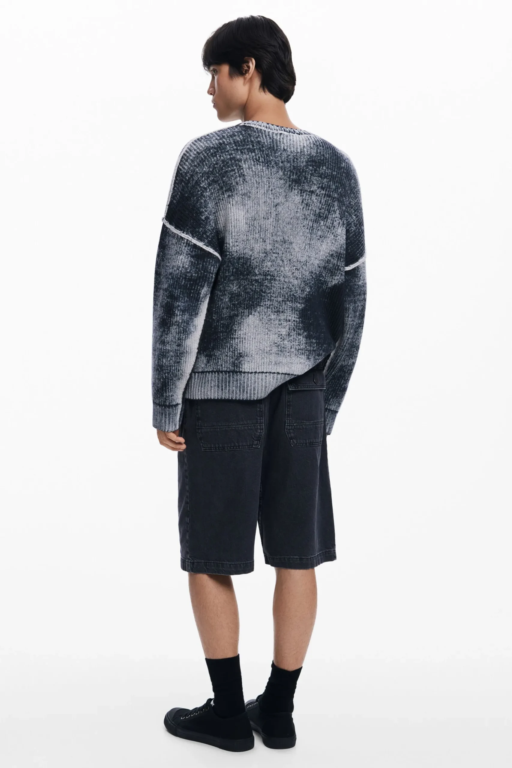 Distressed knit sweater