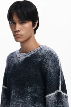 Distressed knit sweater