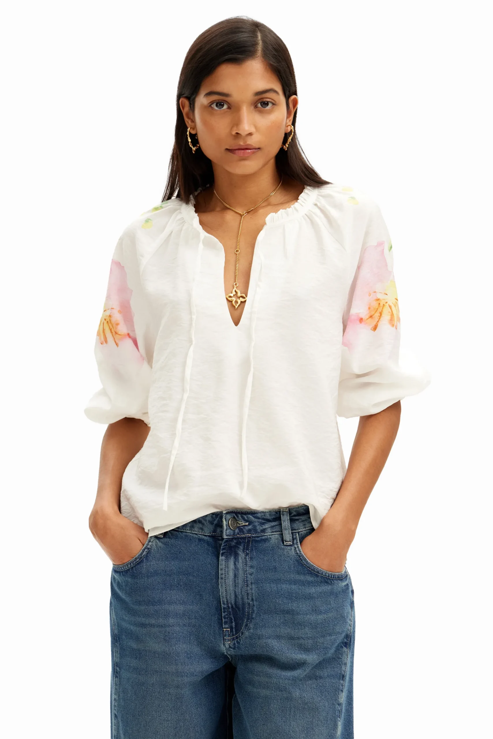 Flowy blouse with watercolor floral print.