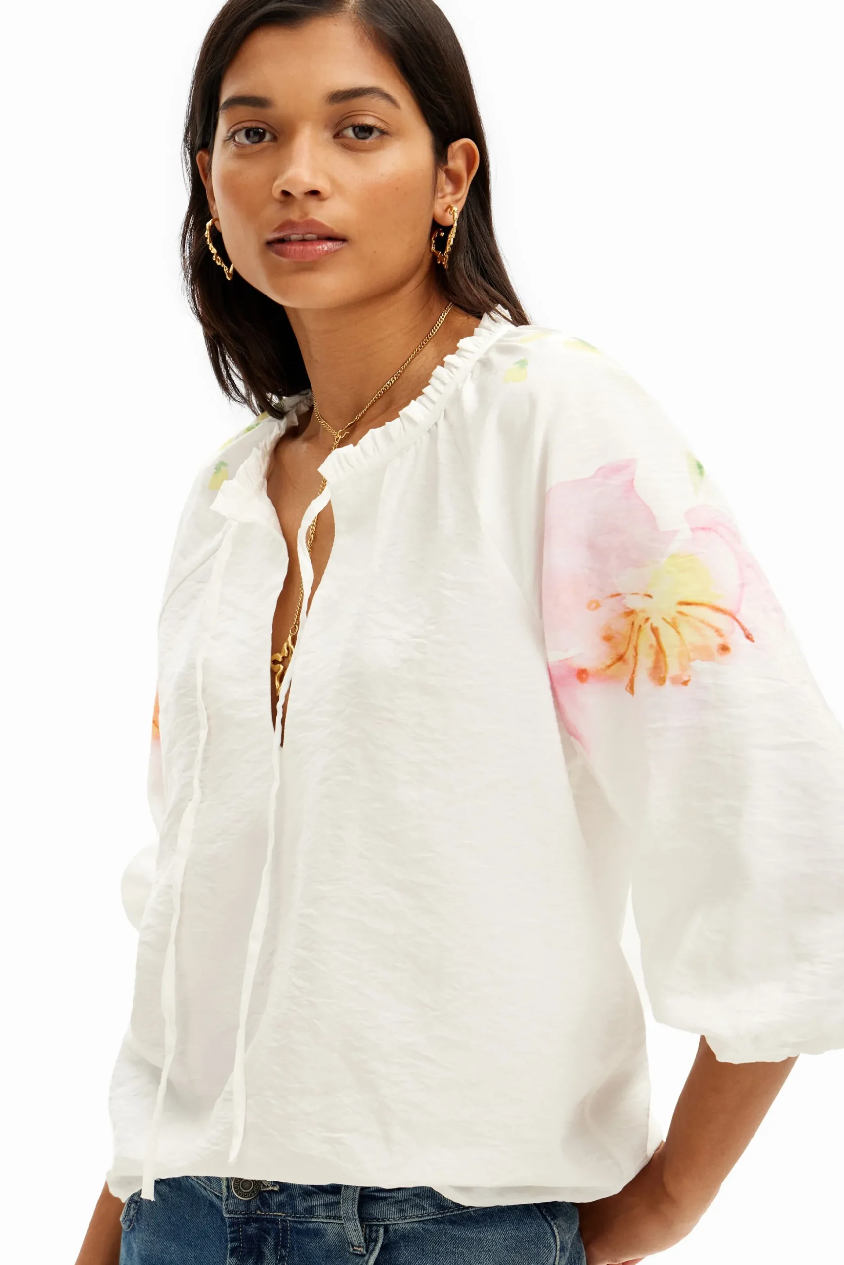 Flowy blouse with watercolor floral print.