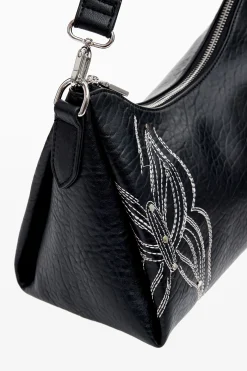 M bag with butterfly engraving