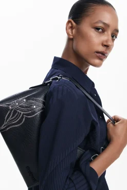 M bag with butterfly engraving