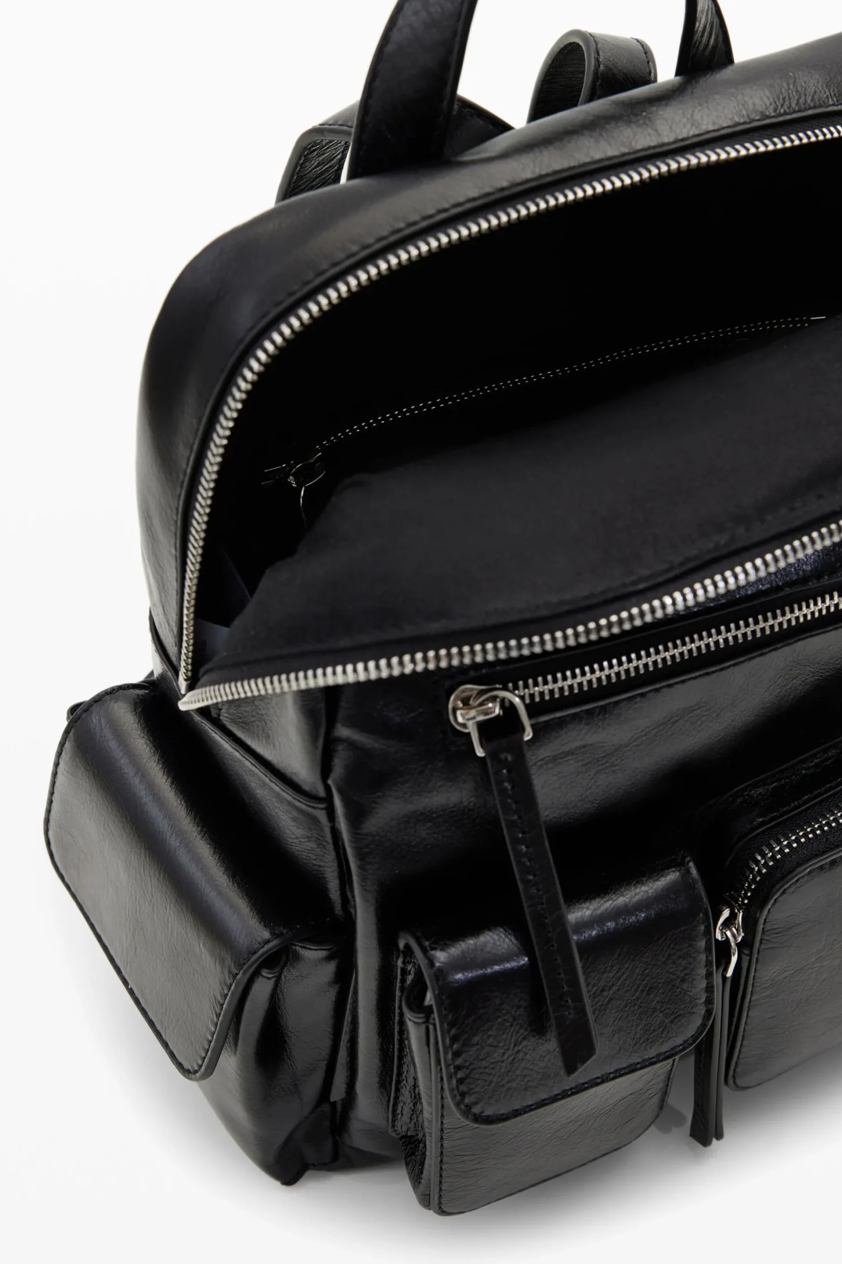 M leather pockets backpack