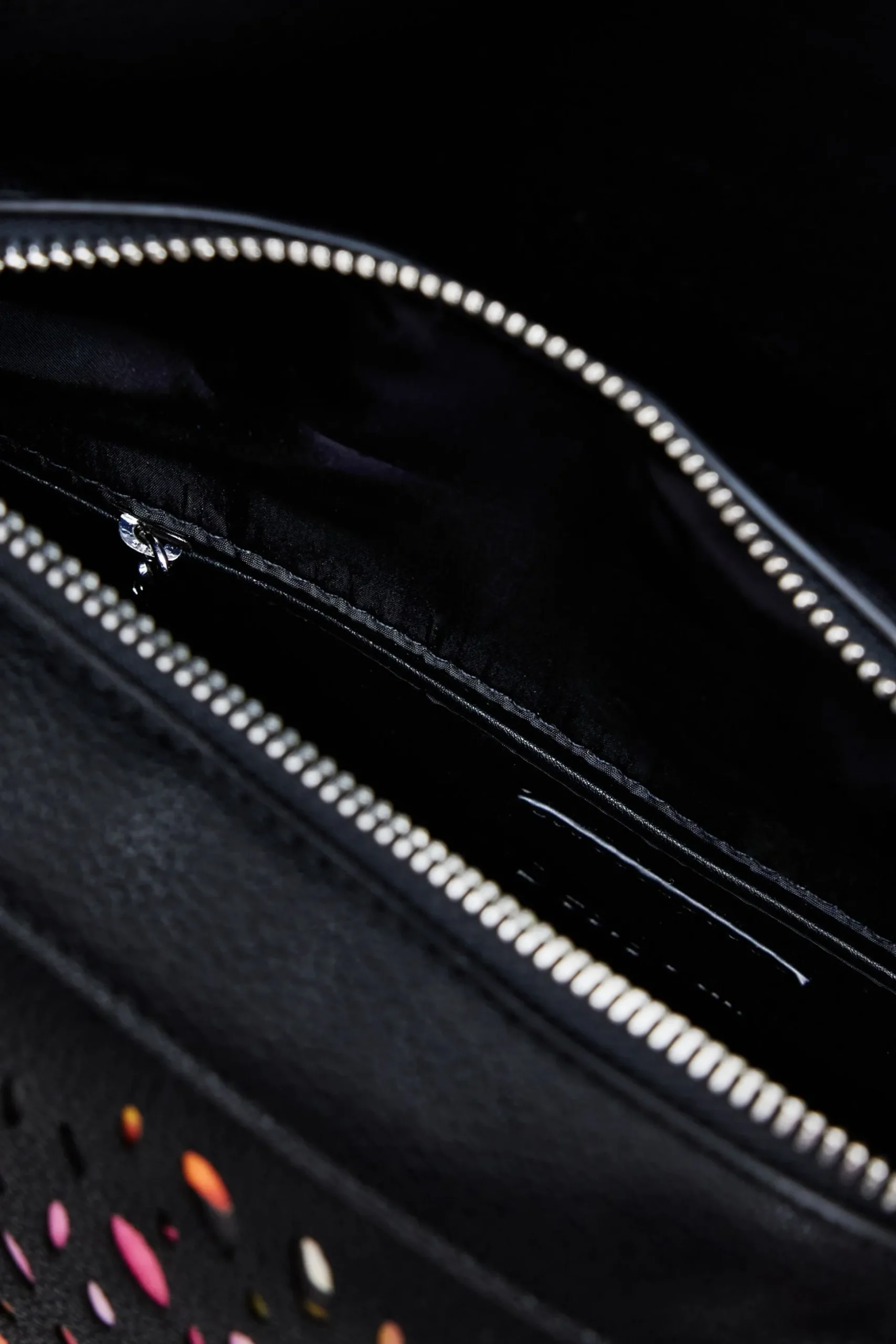 Mini perforated backpack
