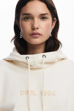 Oversized sweatshirt with sleeve slits