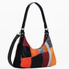 Textured patch shoulder bag