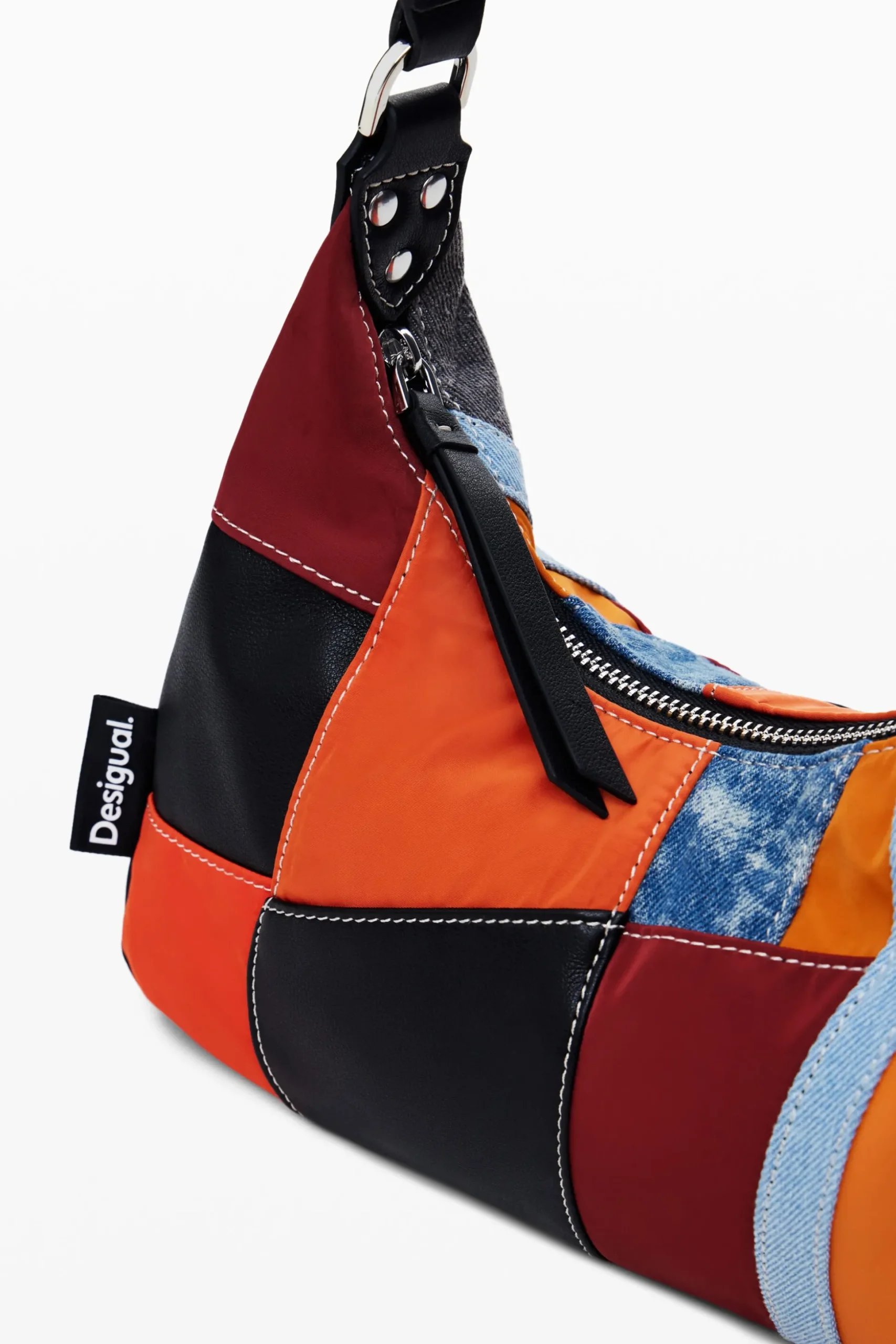 Textured patch shoulder bag