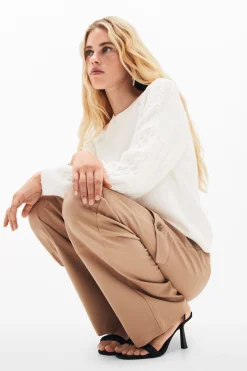 Textured sleeve sweater