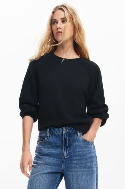 Textured sleeve sweater