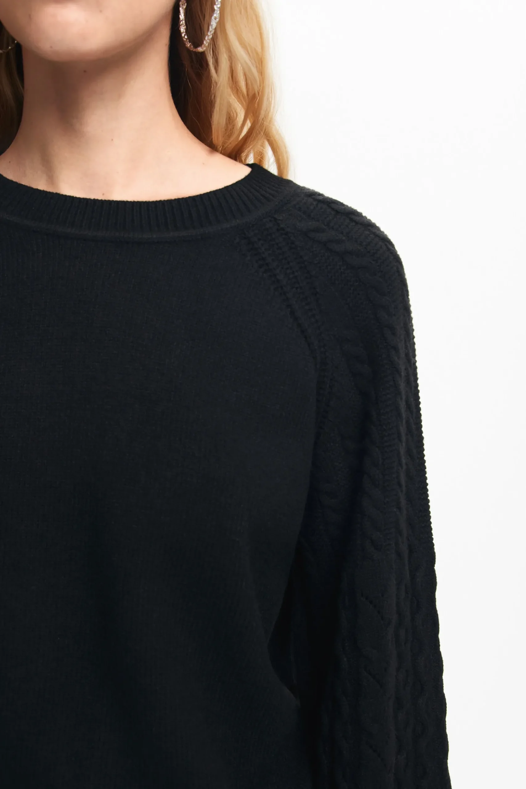 Textured sleeve sweater