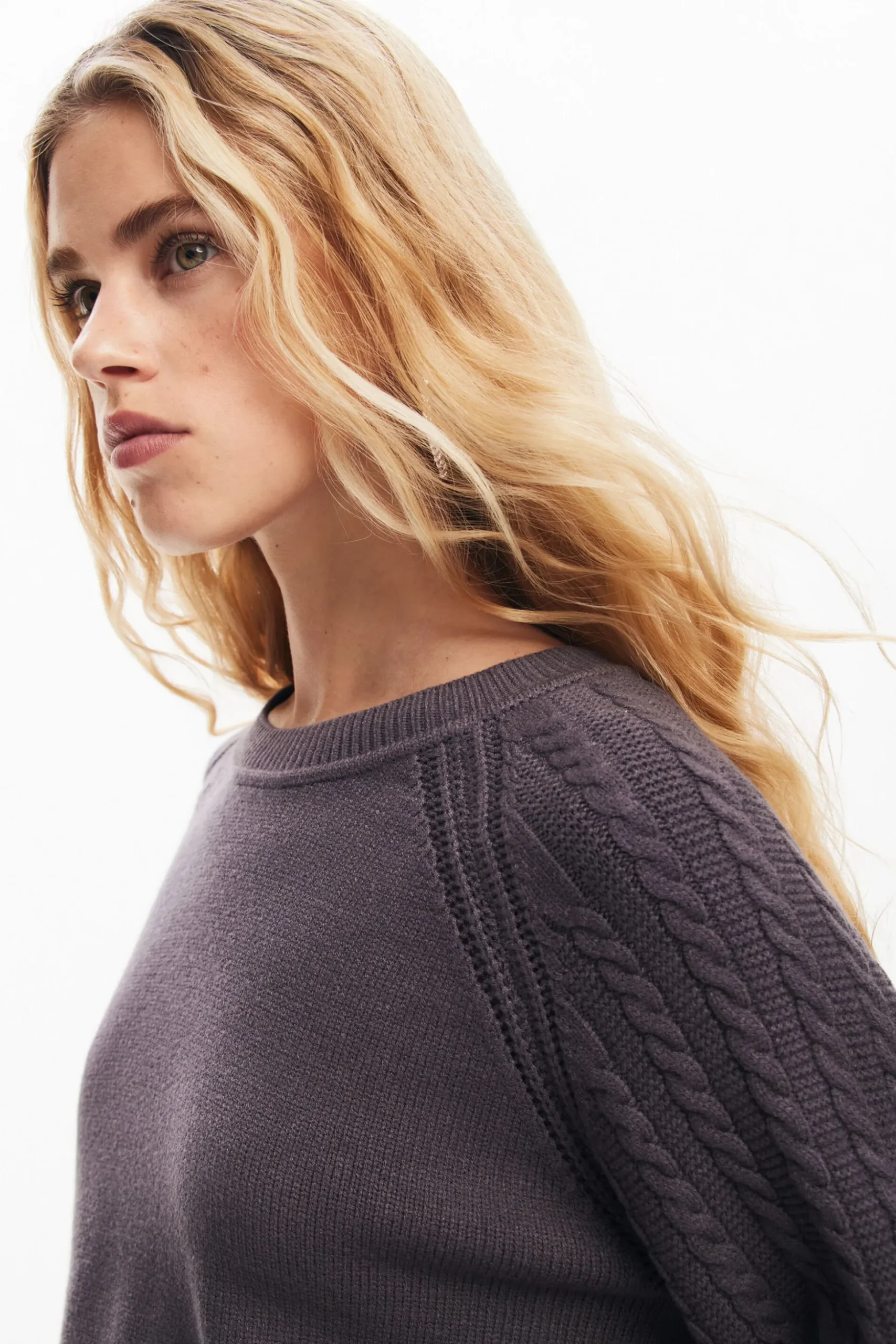 Textured sleeve sweater