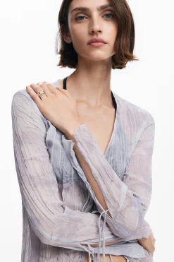 V-neck blouse with ruffles